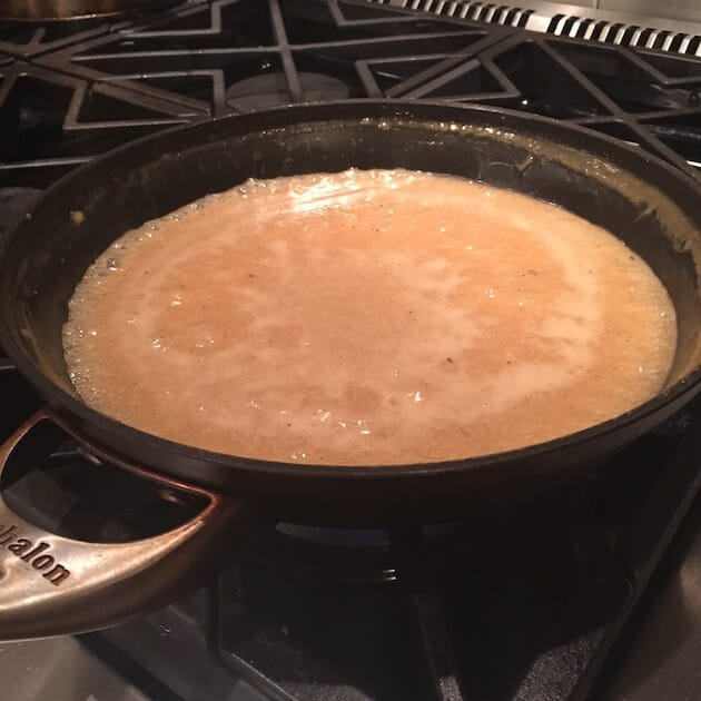 Gravy sauteeing in saucepan on the stove