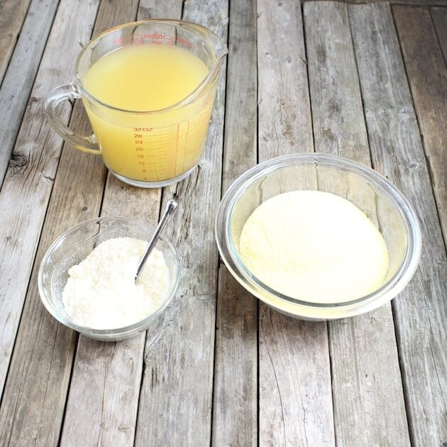 Ingredients for Parmesan Polenta on a farm table