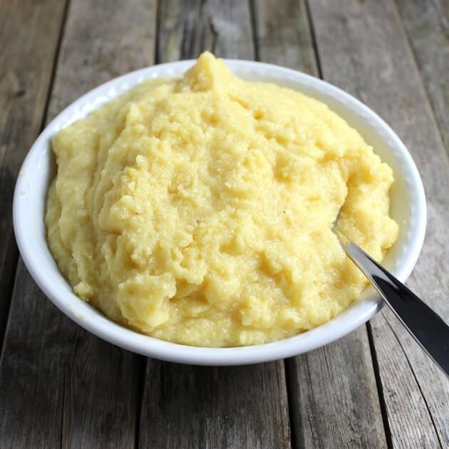 Parmesan Polenta in bowl on farm table