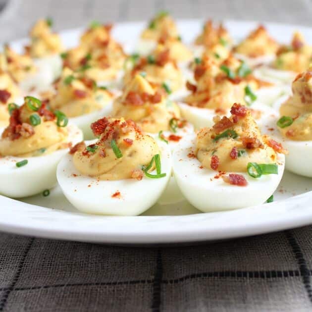 Close up of platter full of Deviled Eggs with Bacon