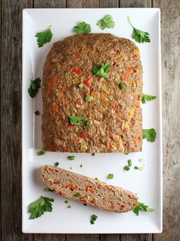 Gluten Free Meat Loaf on a serving platter with parsley garnish 