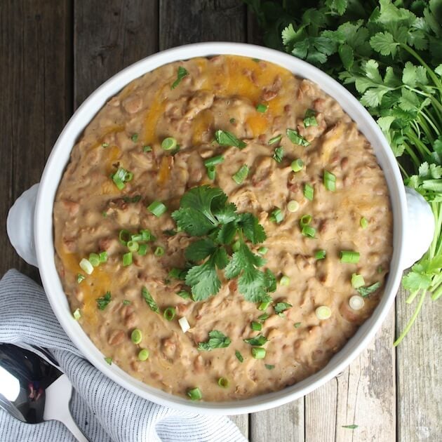 Cooked pinto beans in a serving dish