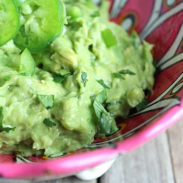 Close up guacamole in mexican serving bowl