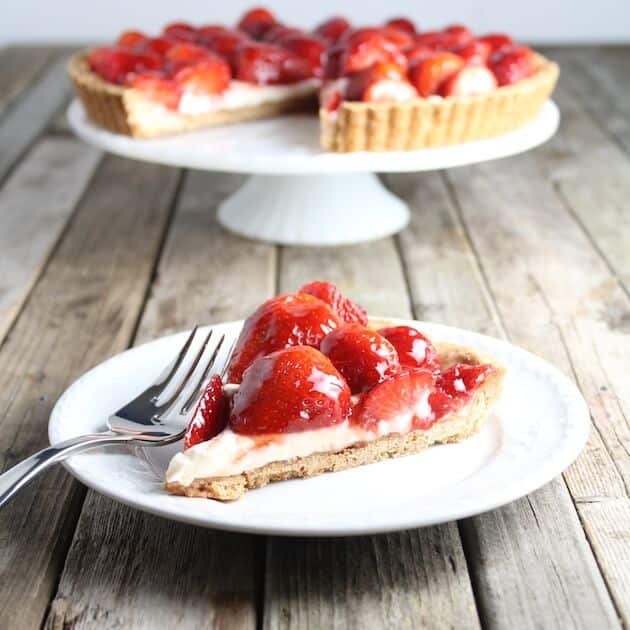 Slice of Strawberry Mascarpone Tart on a plate