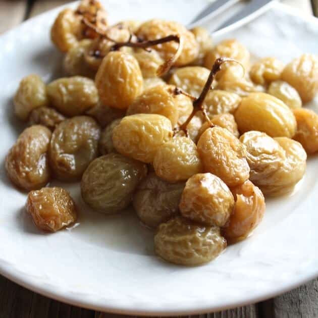 Baked grapes on plate