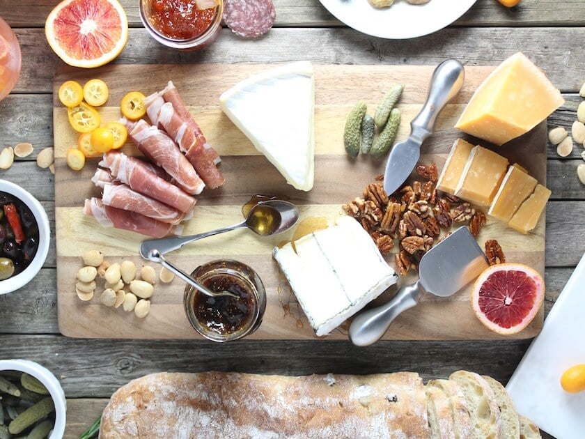 Abundant delicious Cheese Board with many items