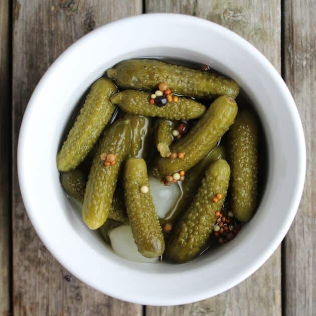 Ramekin of pickles and onions for cheese board