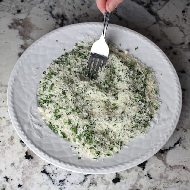 Parmesan and parsley on a plate