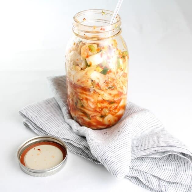 Open Mason jar with Homemade Kimchi 