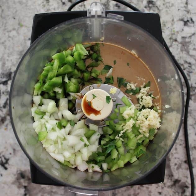 Vegetables in food processor for Lemon Tahini Sauce