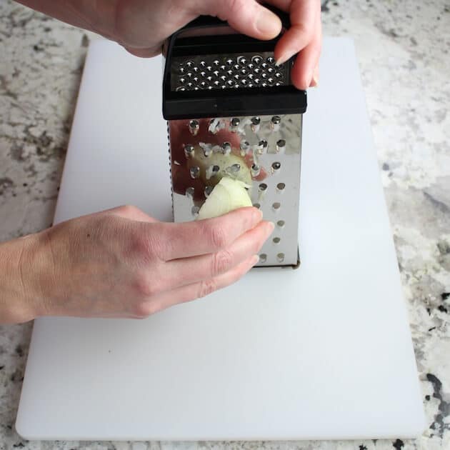 Grating an onion