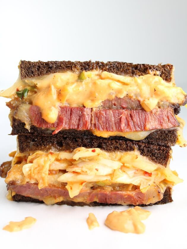 Jaw dropping closeup of a Reuben sandwich with kimchi!