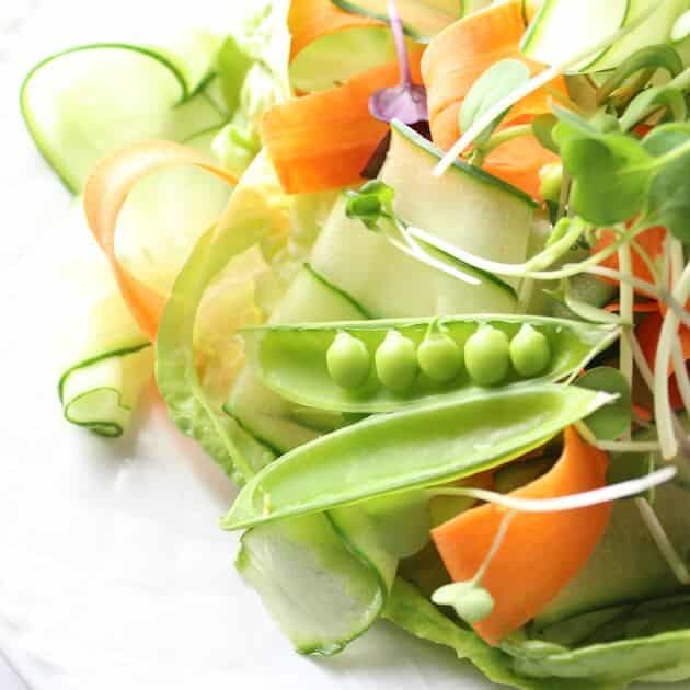 Bright, airy, light, colorful close up of vegetables on plate 