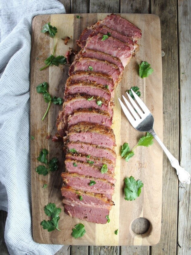 Sliced Corned Beef on cutting board