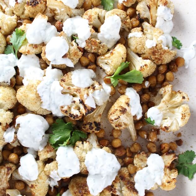 Partial Platter of Roasted Cauliflower And Chickpeas With Yogurt Sauce