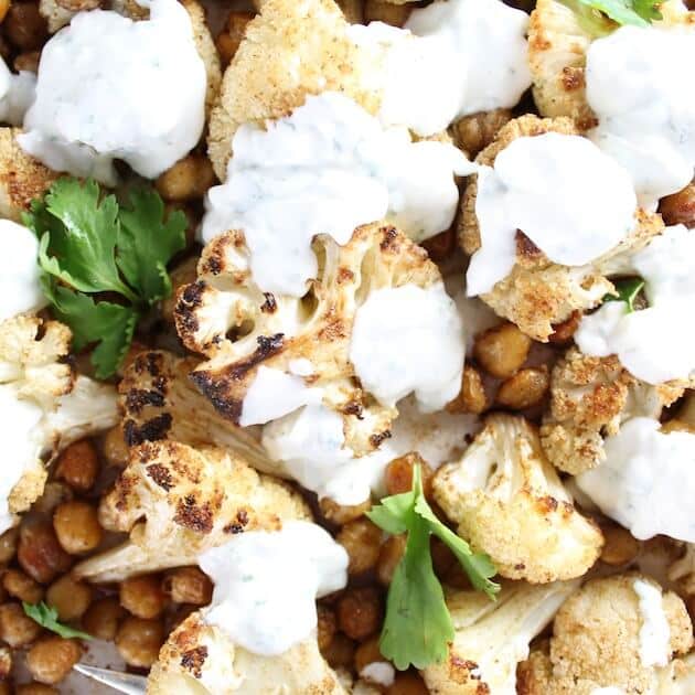 Closeup Cauliflower And Chickpeas With Yogurt Sauce