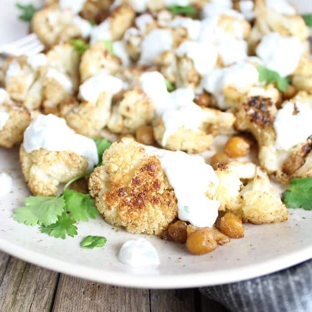 Roasted Cauliflower And Chickpeas With Yogurt Sauce