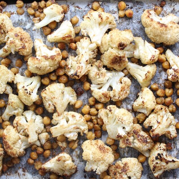 Roasted Cauliflower florets and seasoned Chickpeas on parchment