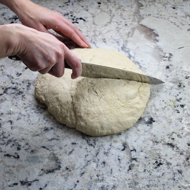 cutting dough into fourths