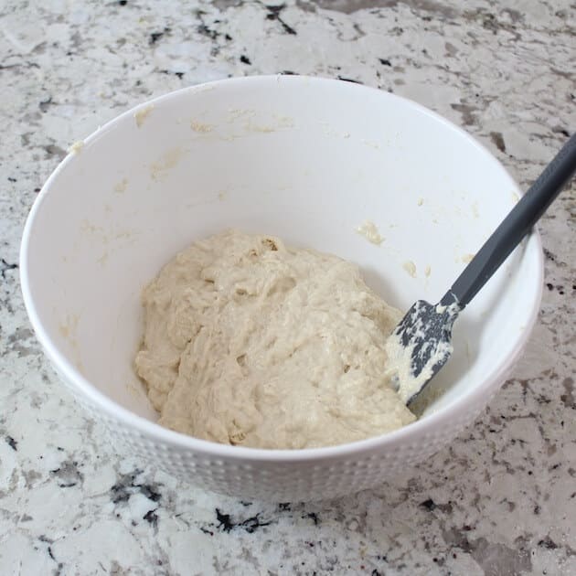 Pizza dough mixed in mixing bowl