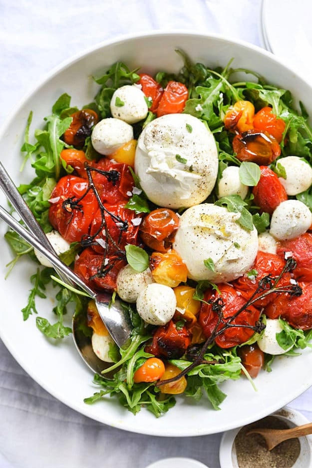 Tomato salad with burrata in bowl