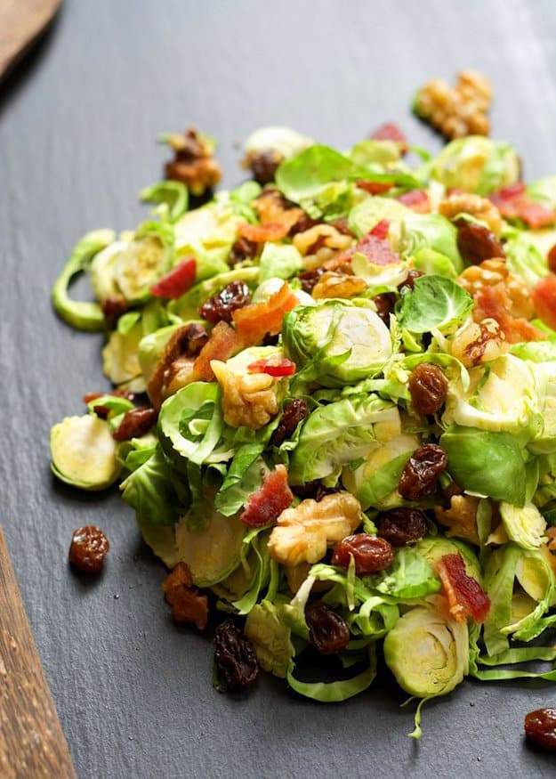 Pile of chopped and shaved brussels sprouts on table