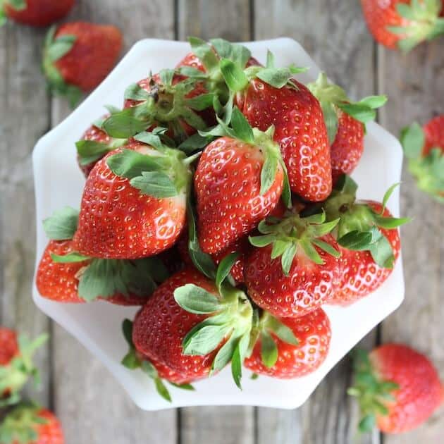 Fresh Strawberries in a dish on farm table