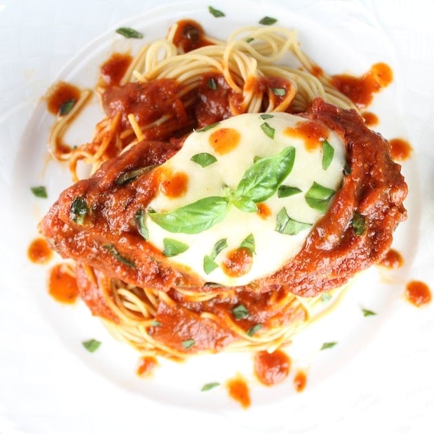 Italian Baked Chicken Caprese on plate with pasta