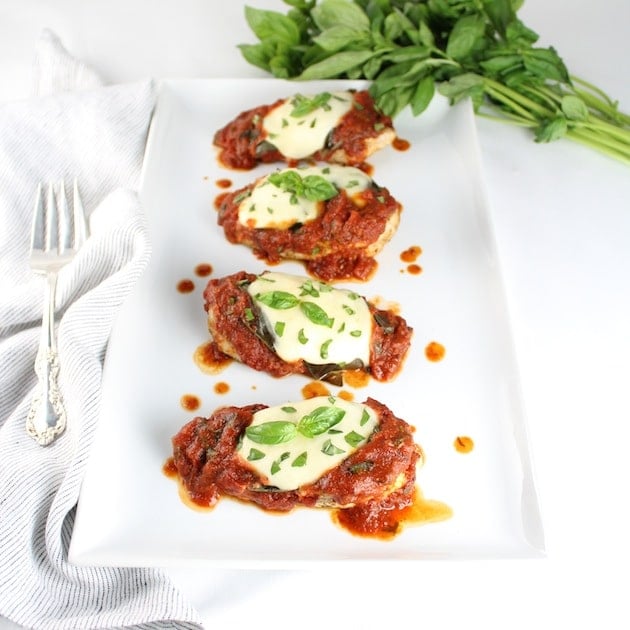 Serving platter with 4 pieces of Italian Baked Chicken Caprese