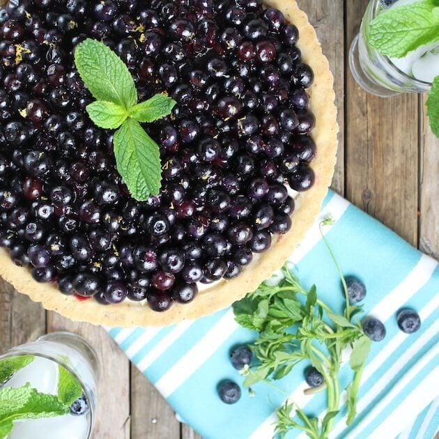 Blueberry Tart with mint garnish