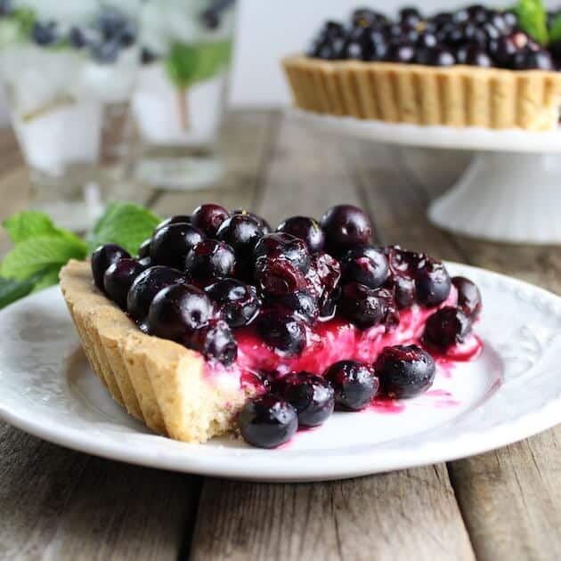 Blueberry tart on a serving plate