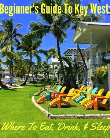 Bright green lawn with colorful Adirondack chairs on Key West, FL