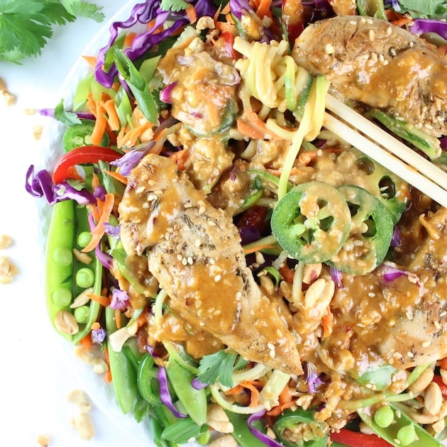 Partial plate of Chicken peanut Satay Salad on zoodles