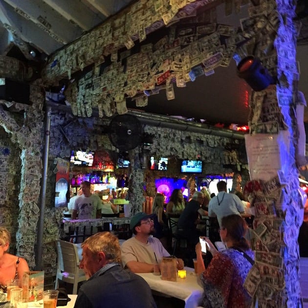 Key West Willie T\'s Bar with hundreds of dollar bills hanging everywhere