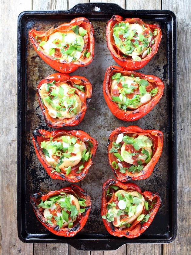  Smoked Mozzarella Chorizo Peppers lined up on a baking sheet