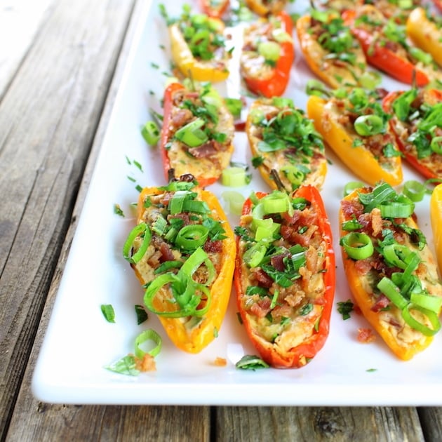 Partial platter eye level Cheesy Ranch Stuffed Mini Peppers