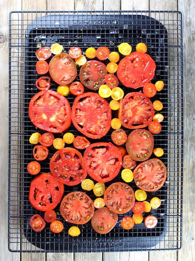 Sliced tomatoes on a wire rack