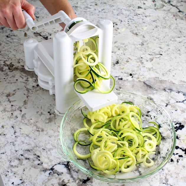 Veggie Spiralizer making zucchini noodles