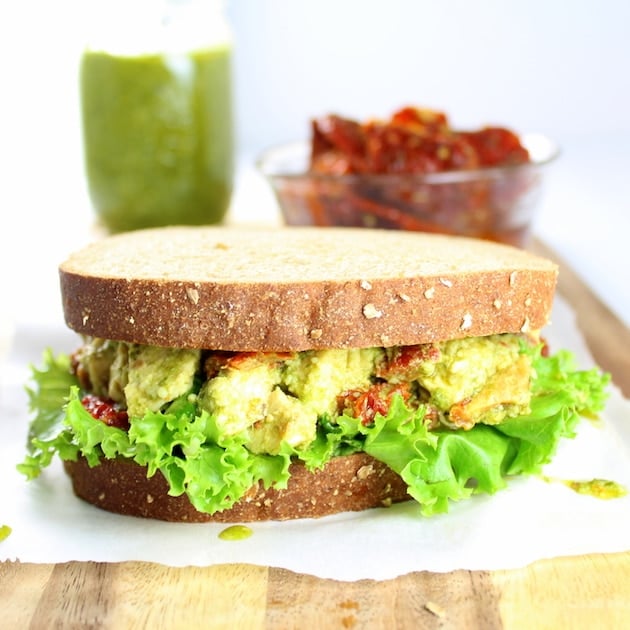 Chicken salad sandwich on a cutting board