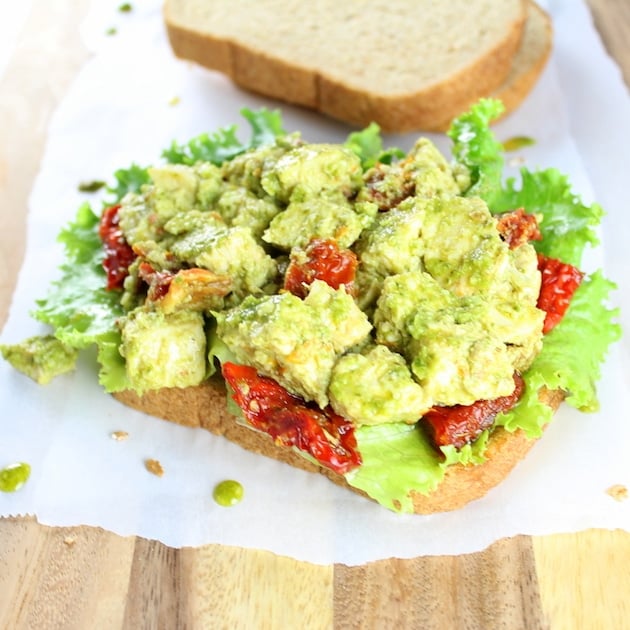 Open faced Chicken salad sandwich on parchment paper