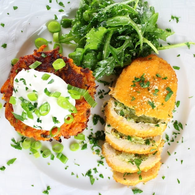 Close up Parmesan Sweet Potato Cakes With Broccoli Cheese Chicken