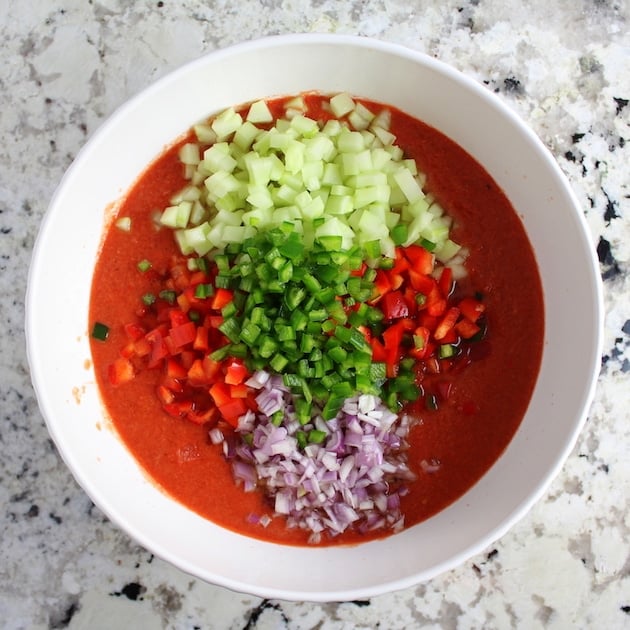 ingredients for gazpacho in a bowl before combining 