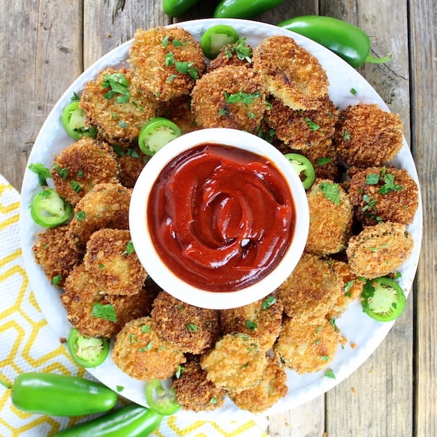 A plate of Fried pickles with spicy Ketchup