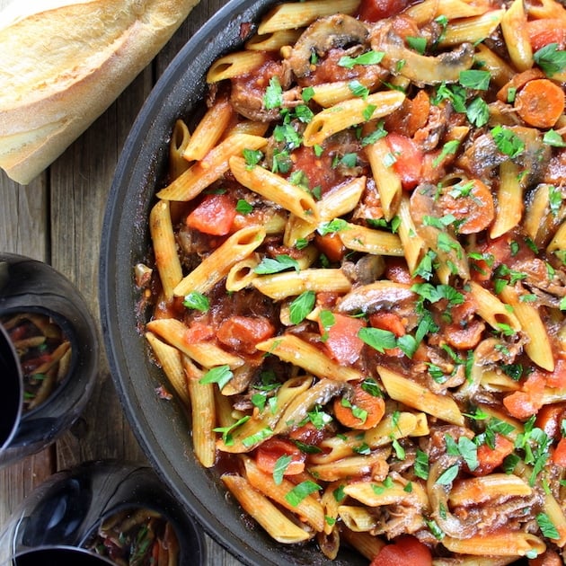 Penne, Crock-Pot Beef, ricotta, tomato, and carrots in a saute pan (Beef Ragu)