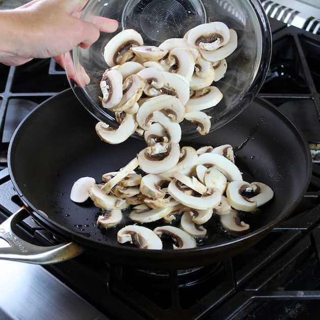 Adding mushrooms to saute pan