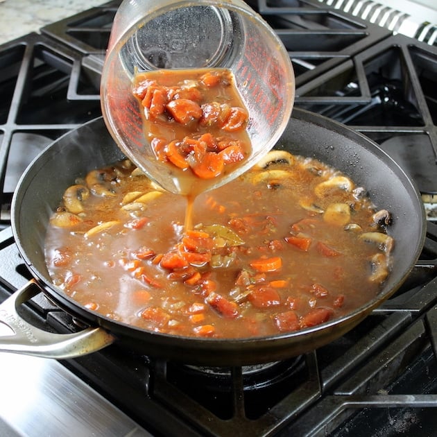 Adding cooked vegetables to saute pan