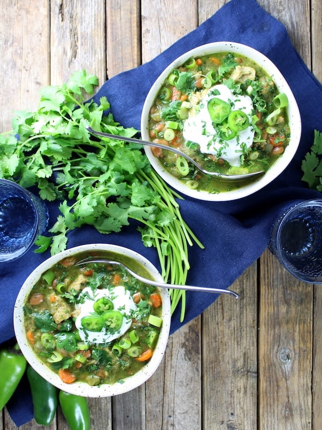 Two bowls of green chili verde chicken soup