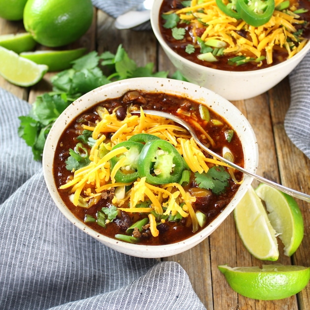 Two bowls of beef and bean chili 