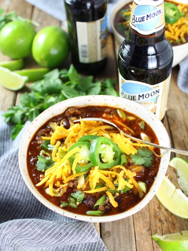 Bowl of chili with a beer