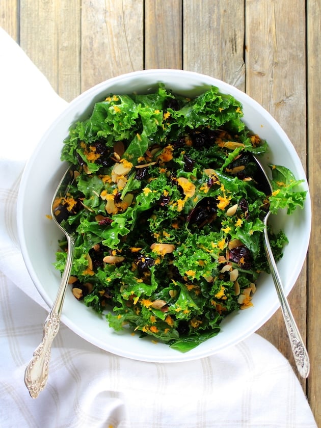 Serving bowl of Kale Orange Cranberry Salad